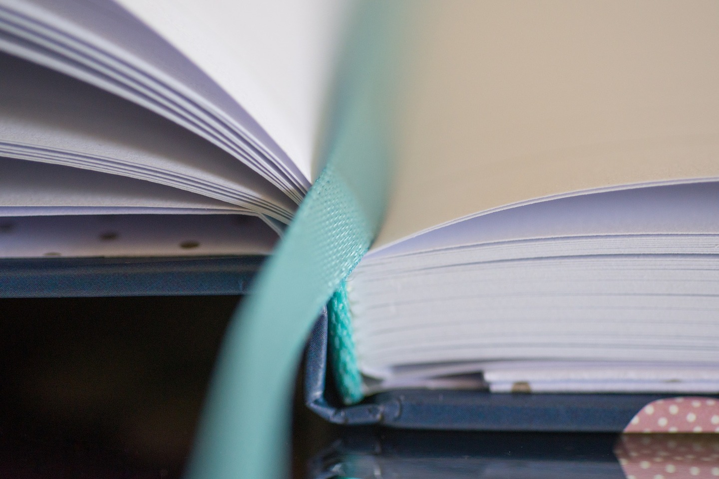 Bottom of a book with a bookmark